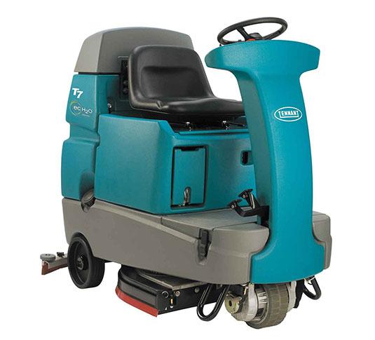 Tennant T7 Commercial Use Rider Scrubber 26IN Teal With 26IN Head On-Board Charger Pad 240Ah Batteries 1/Each