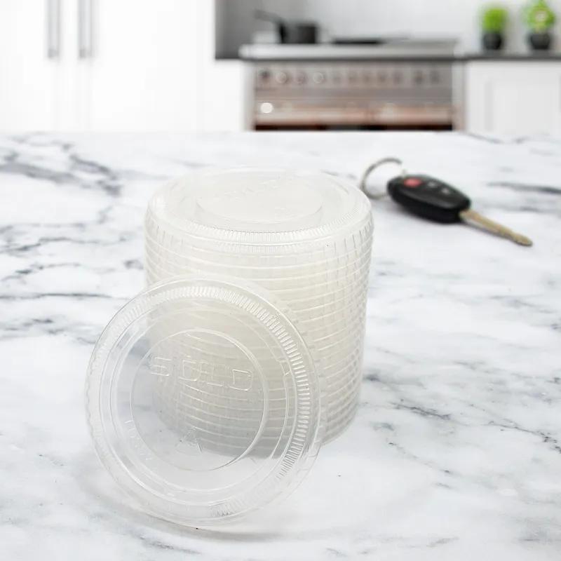 Solo® Sauces, Sides, & Sweets™ Lid Flat 3.343X0.357 IN 1 Compartment PP Clear For 2.5 OZ Souffle & Portion Cup 100 Count/Pack 25 Packs/Case