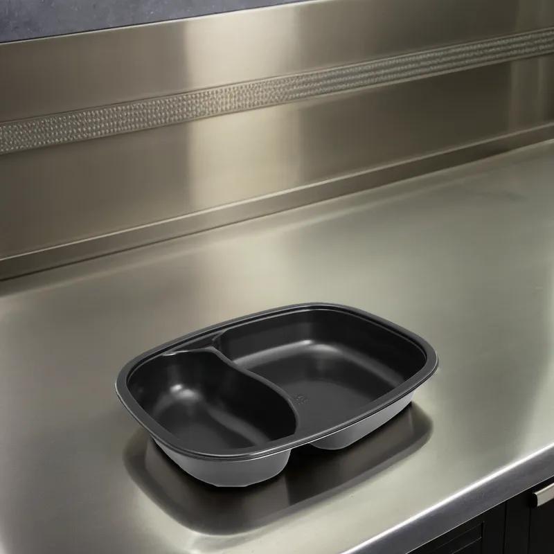 Take-Out Tray 8.50X6.50X1.50 IN 2 Compartment Black Oval Dual Ovenable Freezer Safe 2000/Case