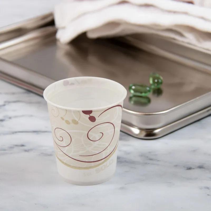 Solo® Cold Cup 5 OZ Wax Coated Paper Multicolor Symphony® Stock Print 100 Count/Pack 30 Packs/Case 3000 Count/Case